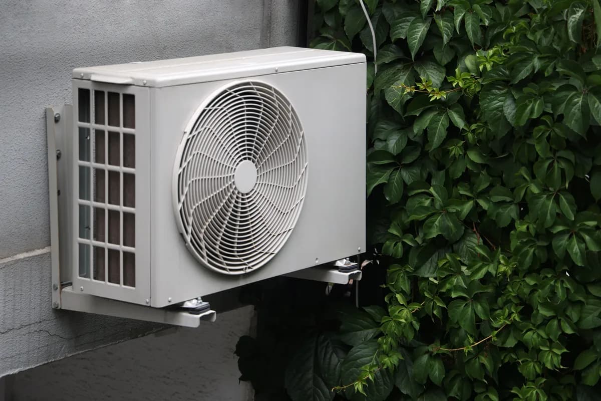 Cold-climate air-source heat pump installed beside a GTA home in winter