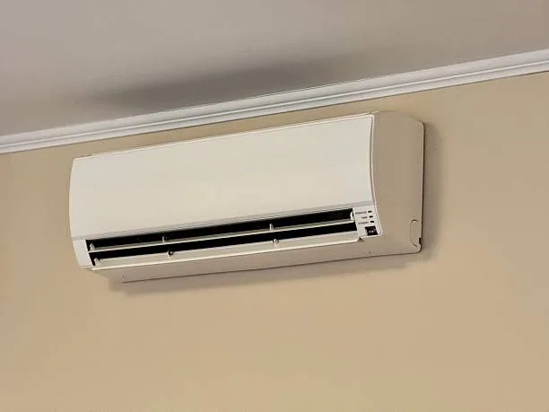 Side-by-side comparison of central AC and ductless mini-split systems