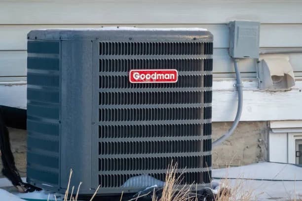 HVAC technician measuring a GTA home for proper air conditioner sizing