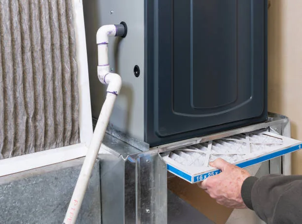 New high-efficiency furnace being installed in a GTA home