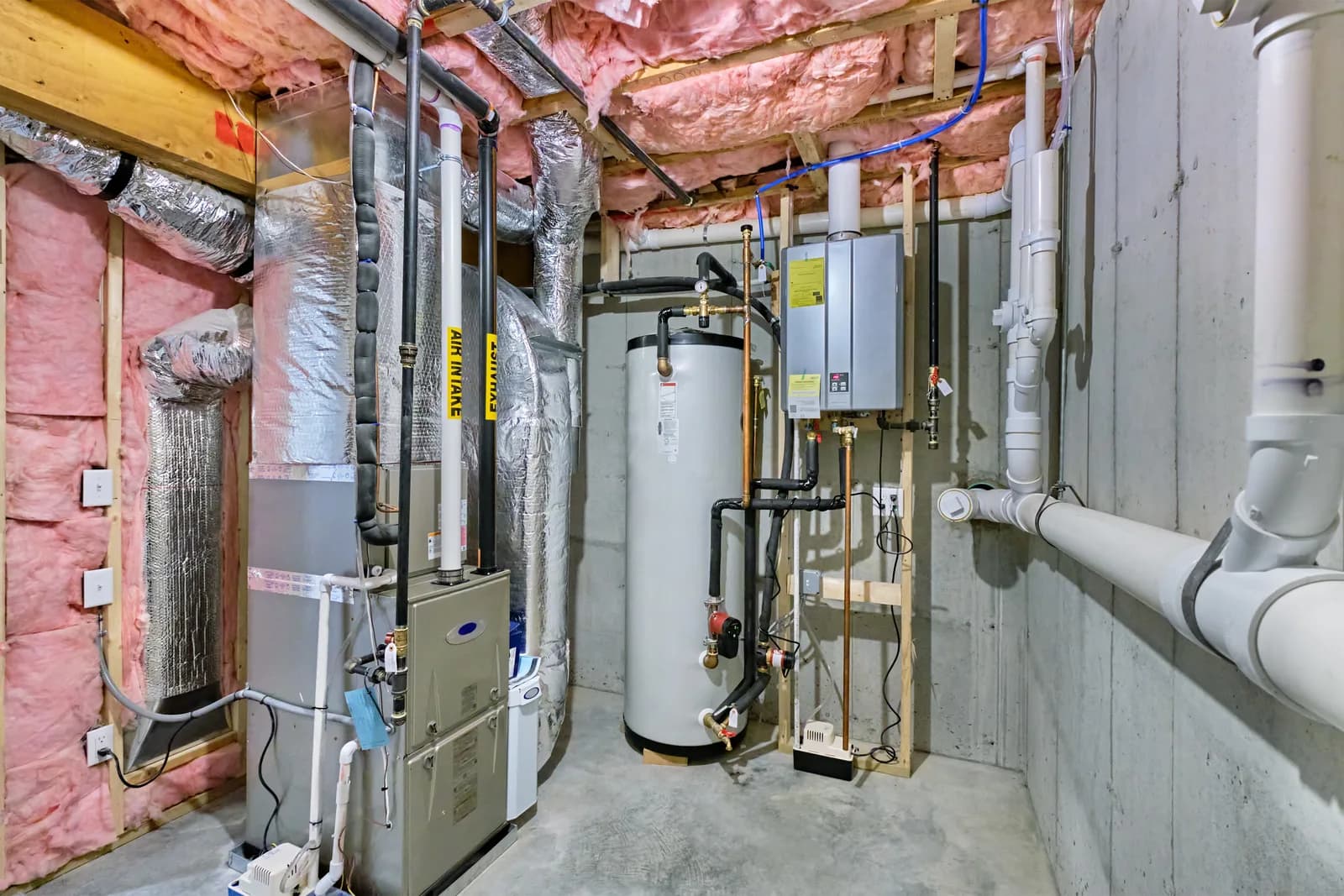 Tank water heater installed in a GTA home mechanical room