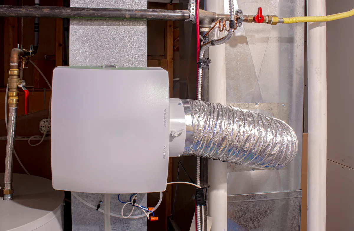 Whole-home bypass humidifier installed on the ductwork of a gas furnace