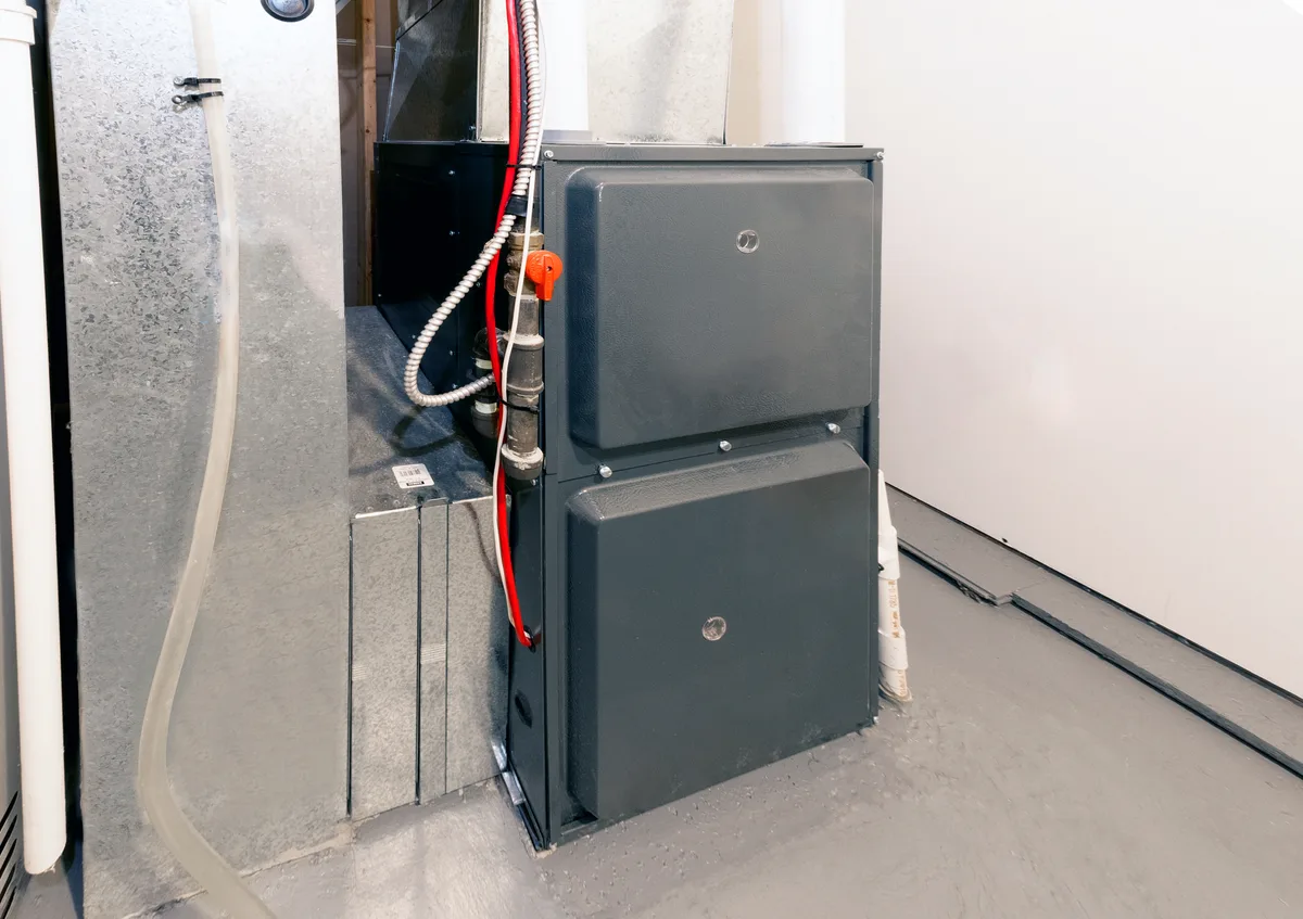 Status light flashing on a gas furnace control board inside the blower compartment