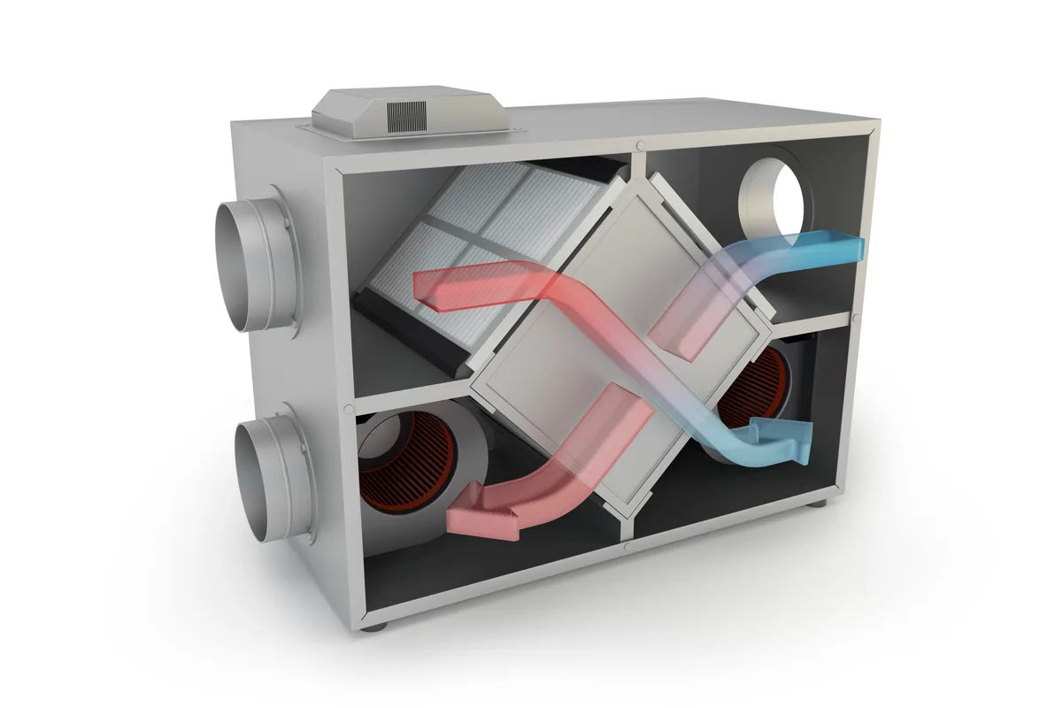 Heat recovery ventilator mounted in a residential basement with insulated ducts