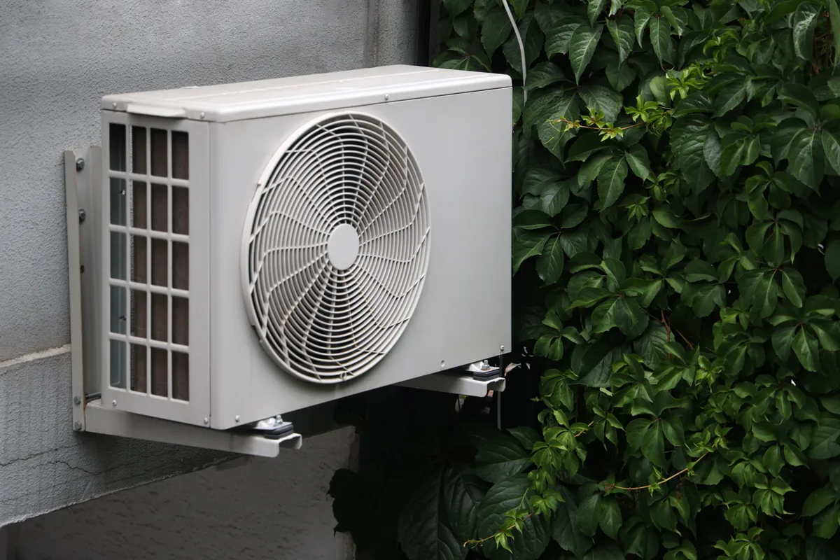 Cold-climate air-source heat pump installed beside a GTA home in winter