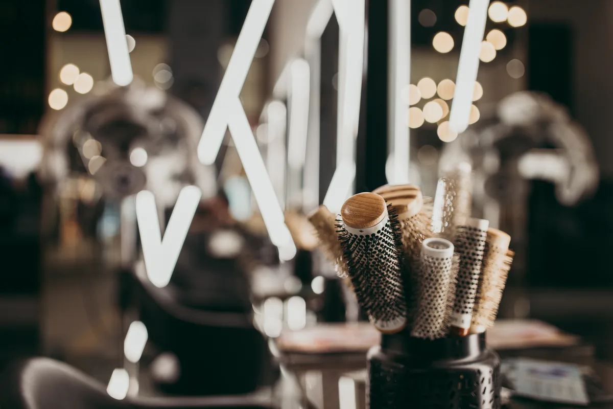 Hair salon interior with chairs and mirrors